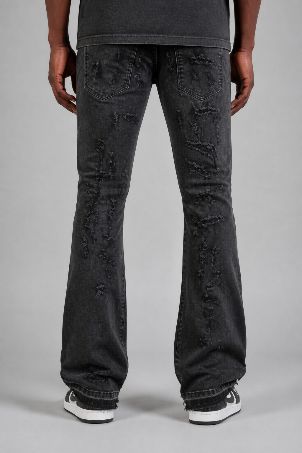 Damati Ripped Stacked Jeans