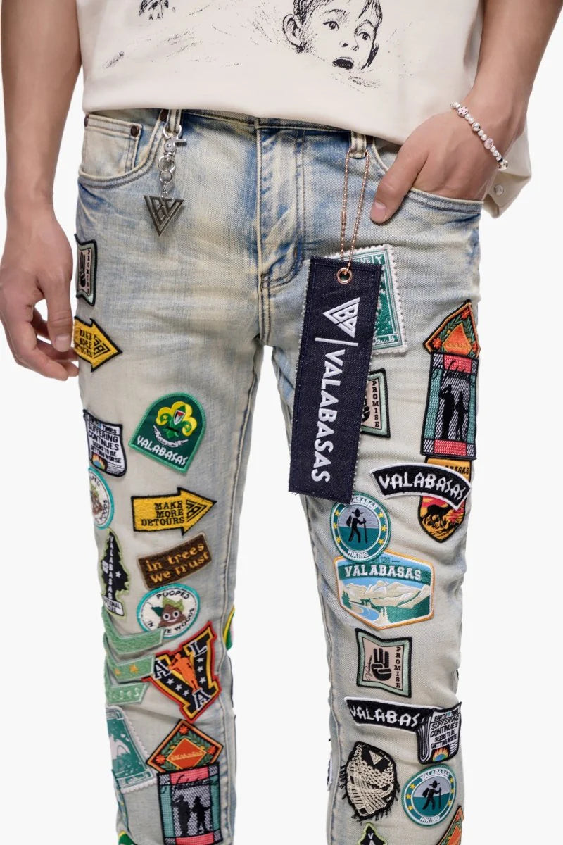 Valabasas Axis" Stacked Light Blue Jeans with Patches