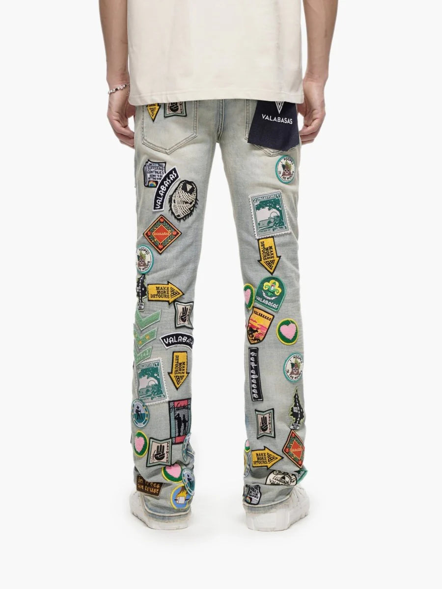 Valabasas Axis" Stacked Light Blue Jeans with Patches
