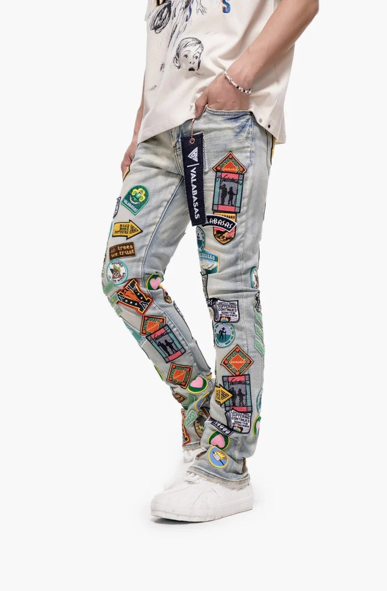 Valabasas Axis" Stacked Light Blue Jeans with Patches