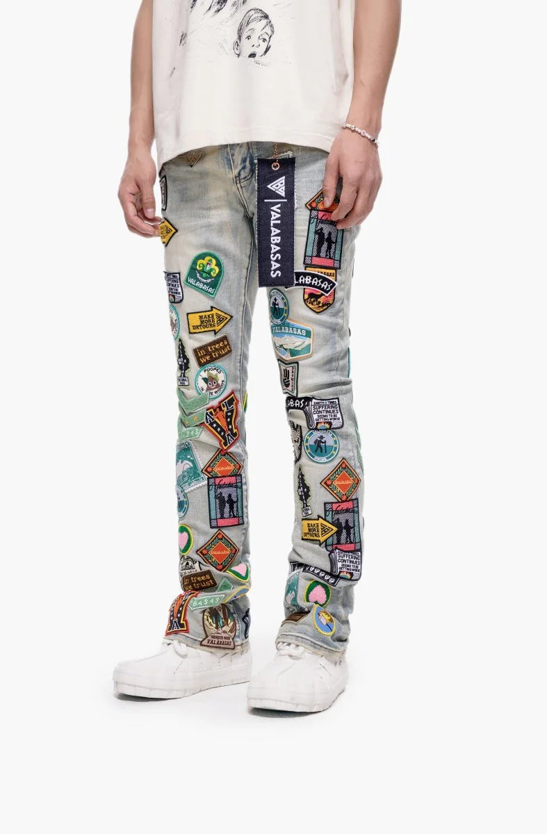 Valabasas Axis" Stacked Light Blue Jeans with Patches