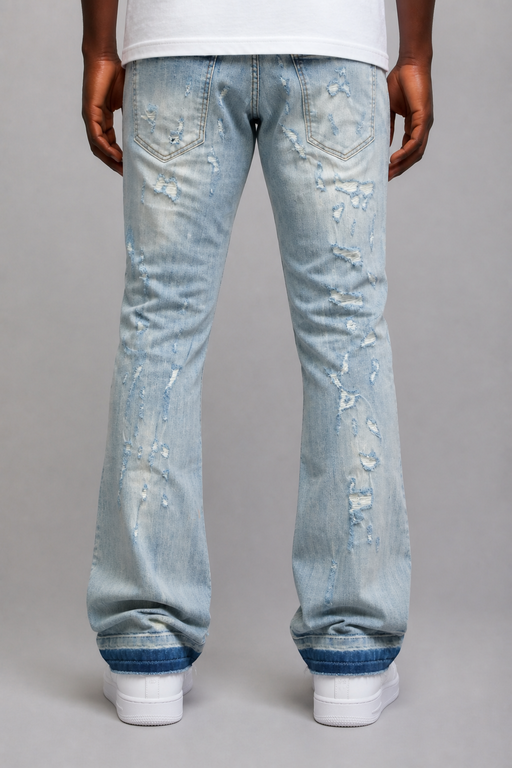 Damati Ripped Stacked Jeans