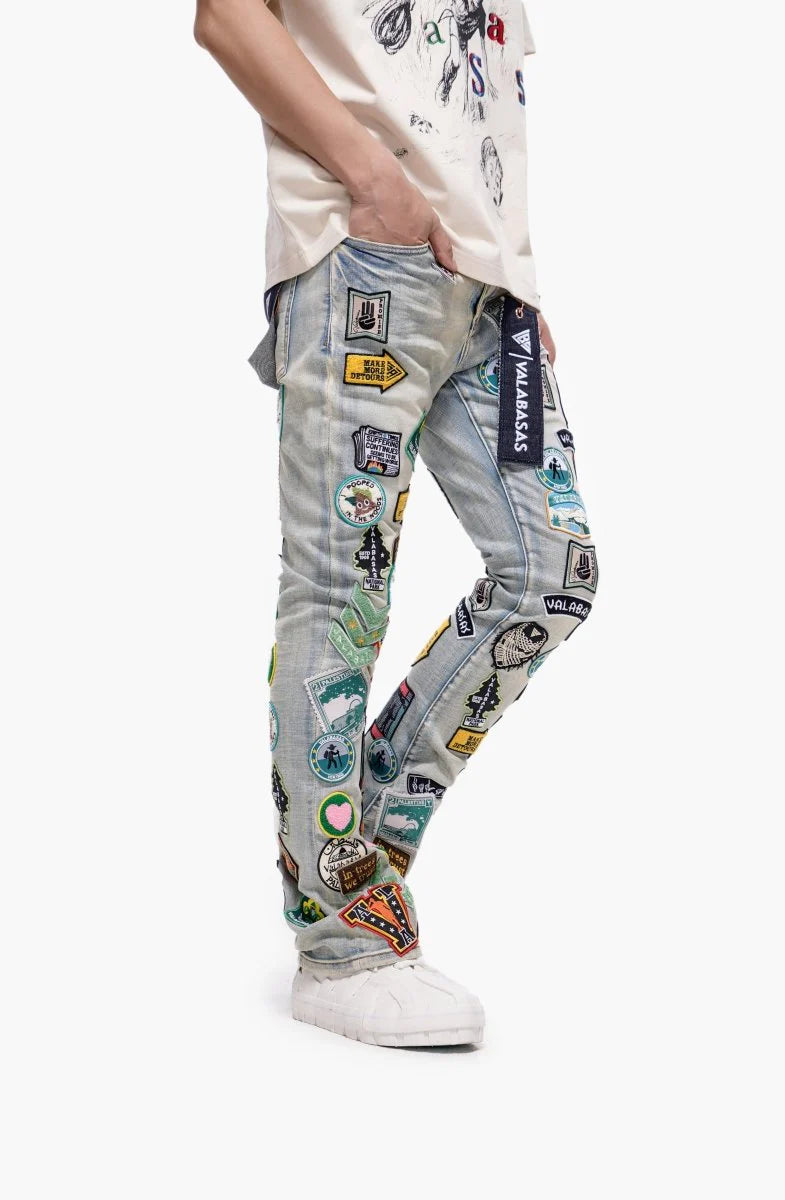 Valabasas Axis" Stacked Light Blue Jeans with Patches