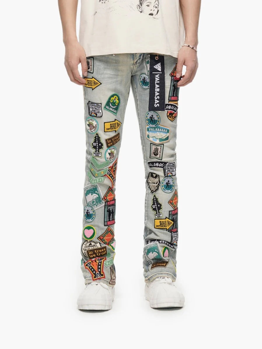 Valabasas Axis" Stacked Light Blue Jeans with Patches