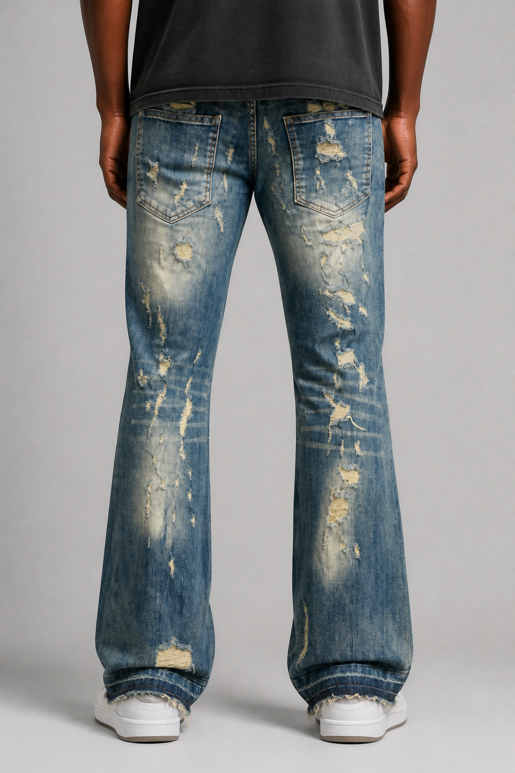 Damati Ripped Stacked Jeans