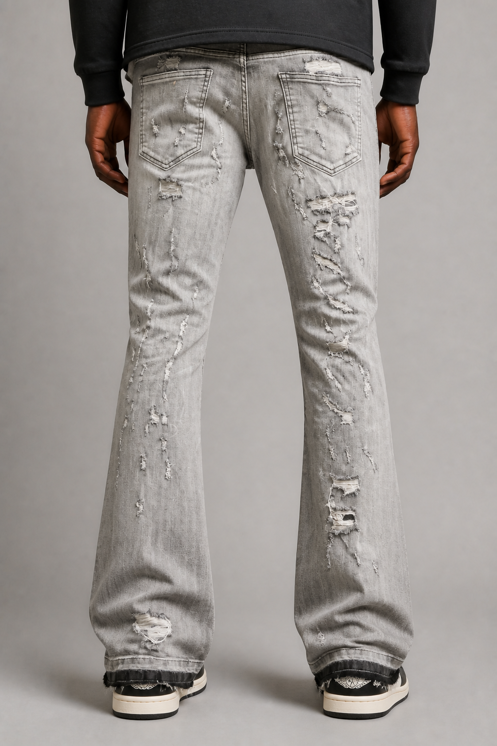 Damati Ripped Stacked Jeans